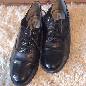 Patent leather Jennifer Lopez dress shoes.